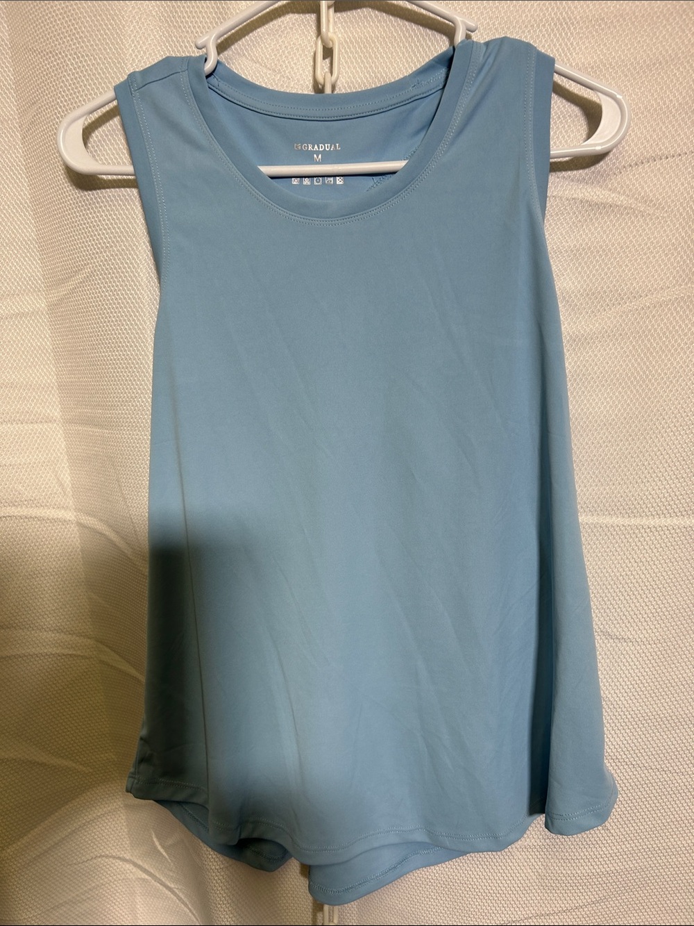 Light Blue Women's Sleeveless Razor Back Tank Top - size medium